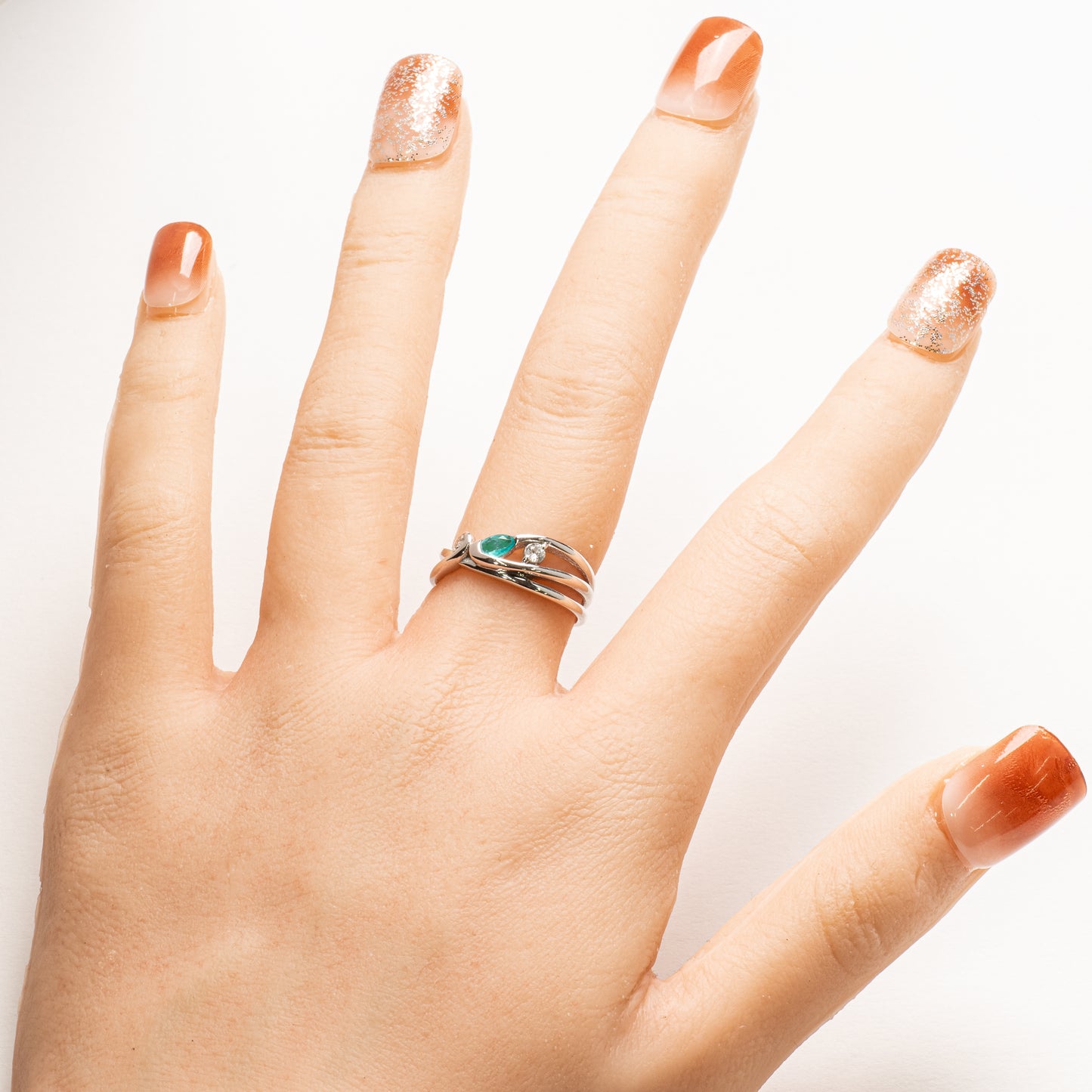 パライバトルマリン0.10ct ダイヤモンド0.15ct K18WG リング