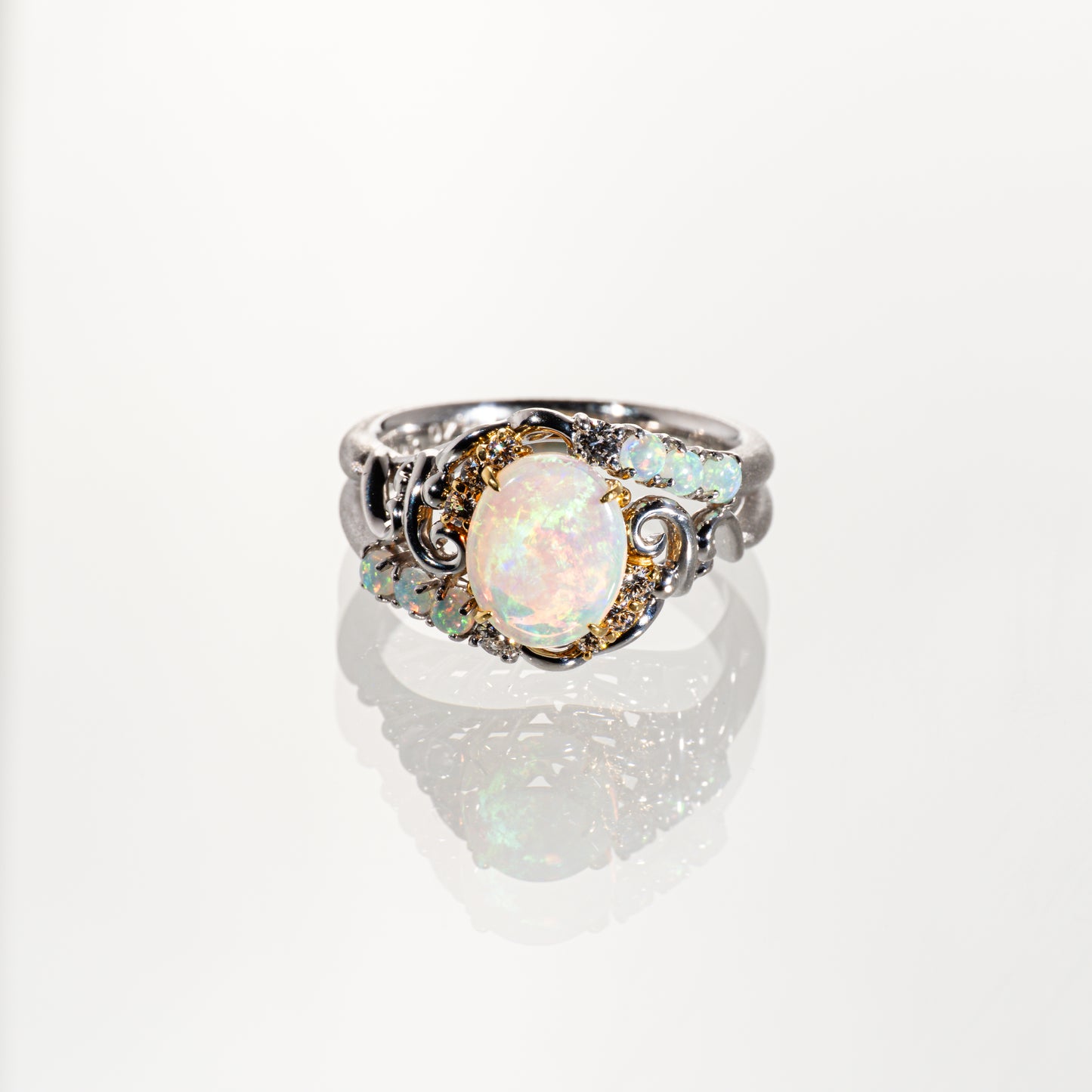 POLA エチオピアオパール1.40ct ダイヤモンド0.22ct Pt900/K18 ボタニカルリング