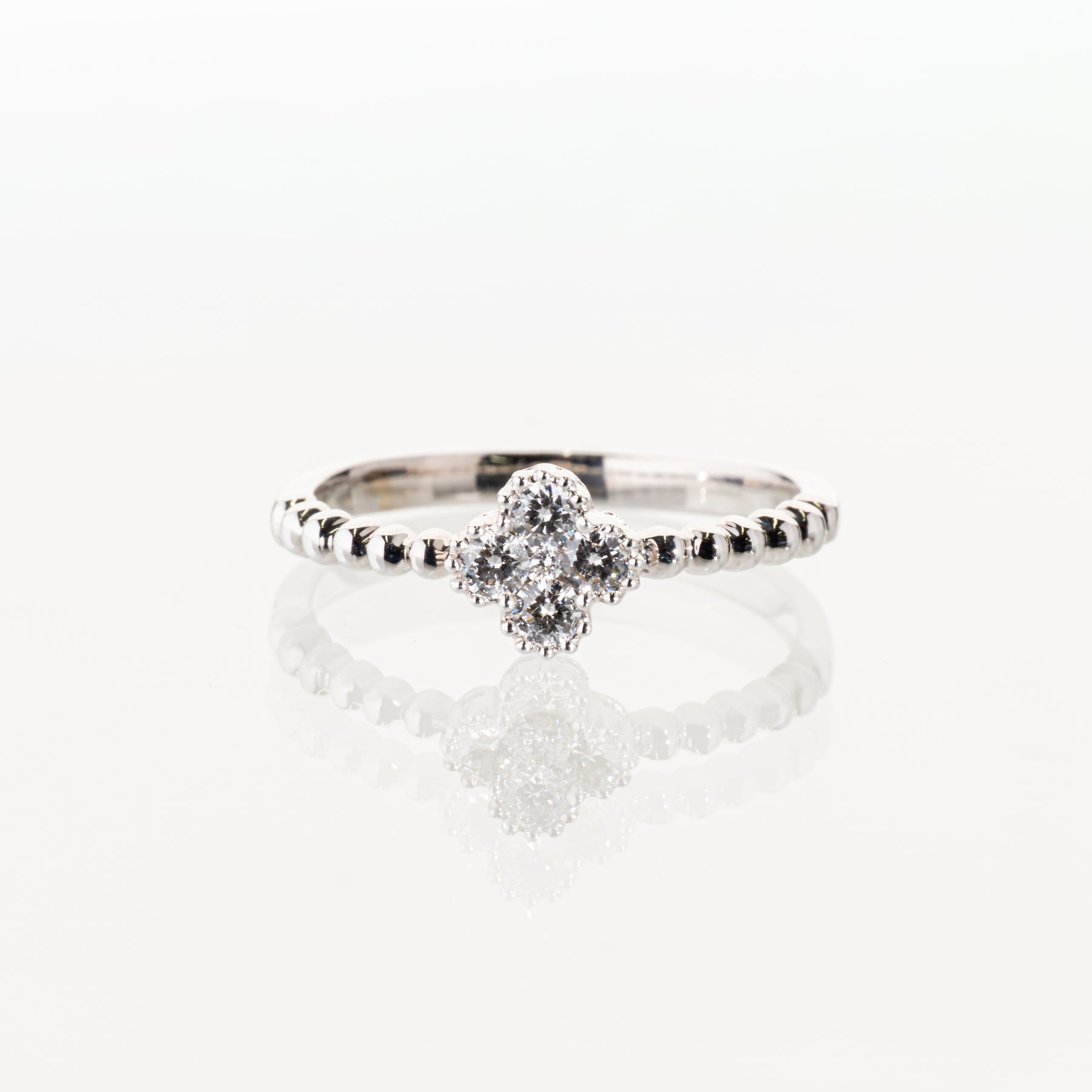 ダイヤモンド0.25ct K18WG フラワーリング