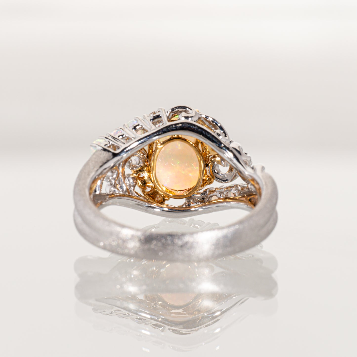 POLA エチオピアオパール1.40ct ダイヤモンド0.22ct Pt900/K18 ボタニカルリング