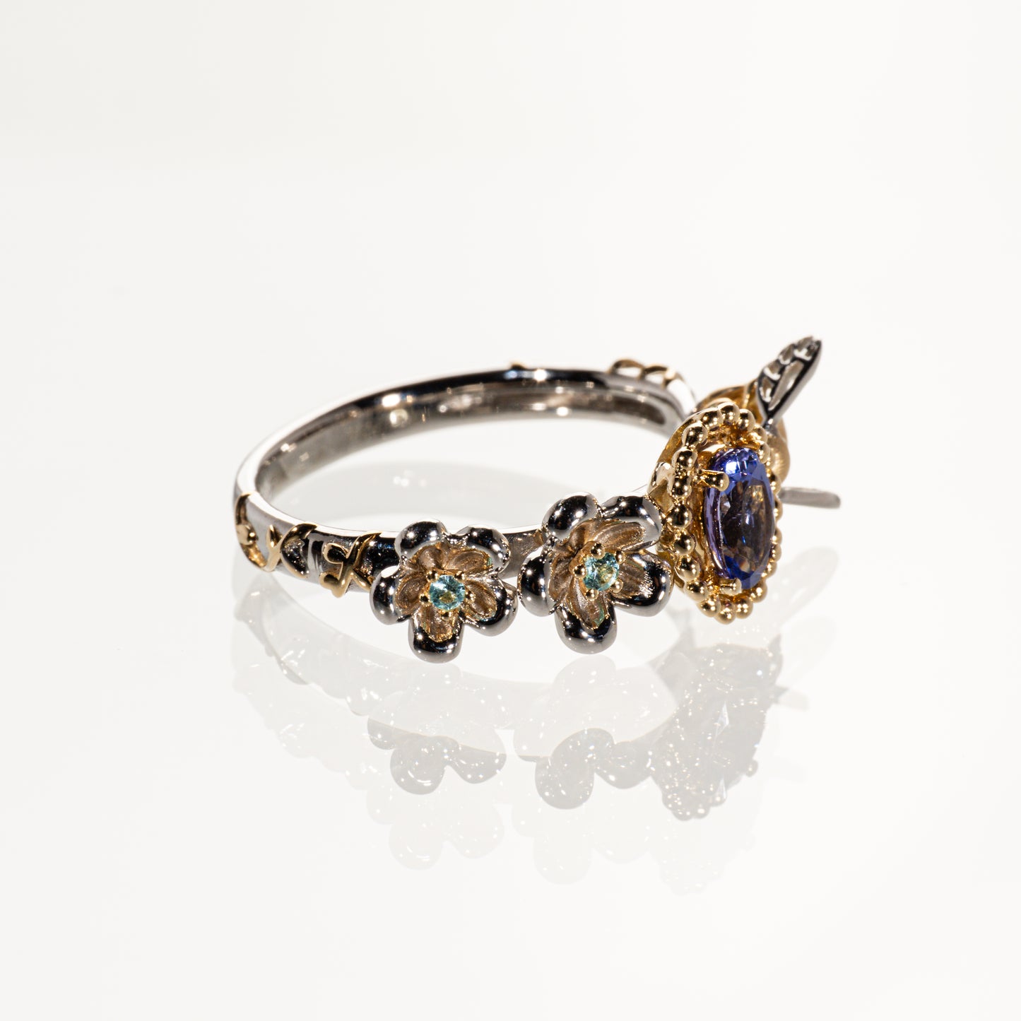 タンザナイト0.35ct ブルートルマリン0.02ct Pt950/K18 リング