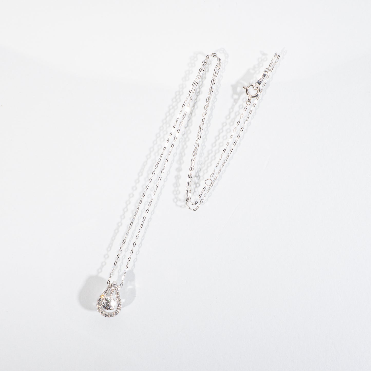 ダイヤモンド0.304ct メレダイヤモンド 0.18ct / 0.02ct Pt950 ホースシューネックレス