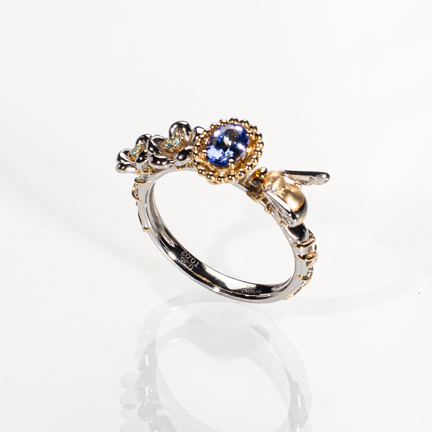 タンザナイト0.35ct ブルートルマリン0.02ct Pt950/K18 リング