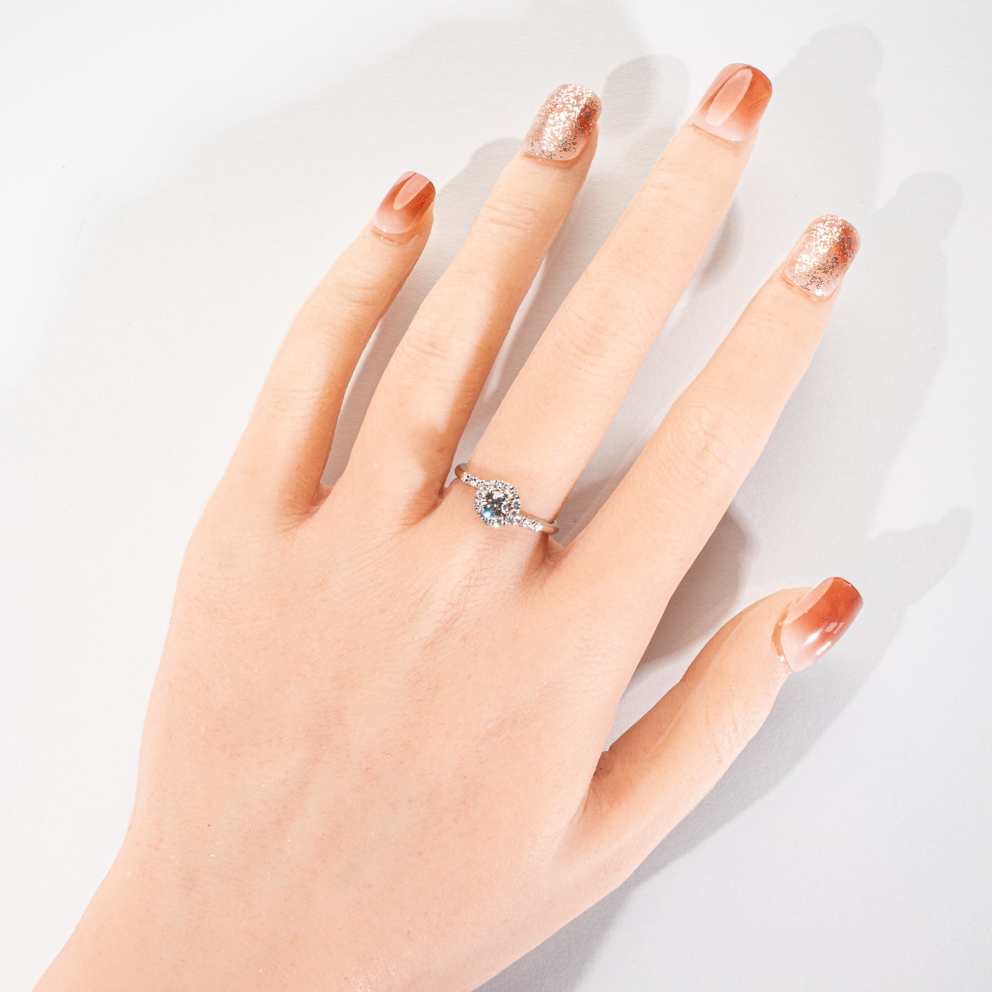 ダイヤモンド0.251ct メレダイヤモンド0.19ct Pt900 ヘイローリング