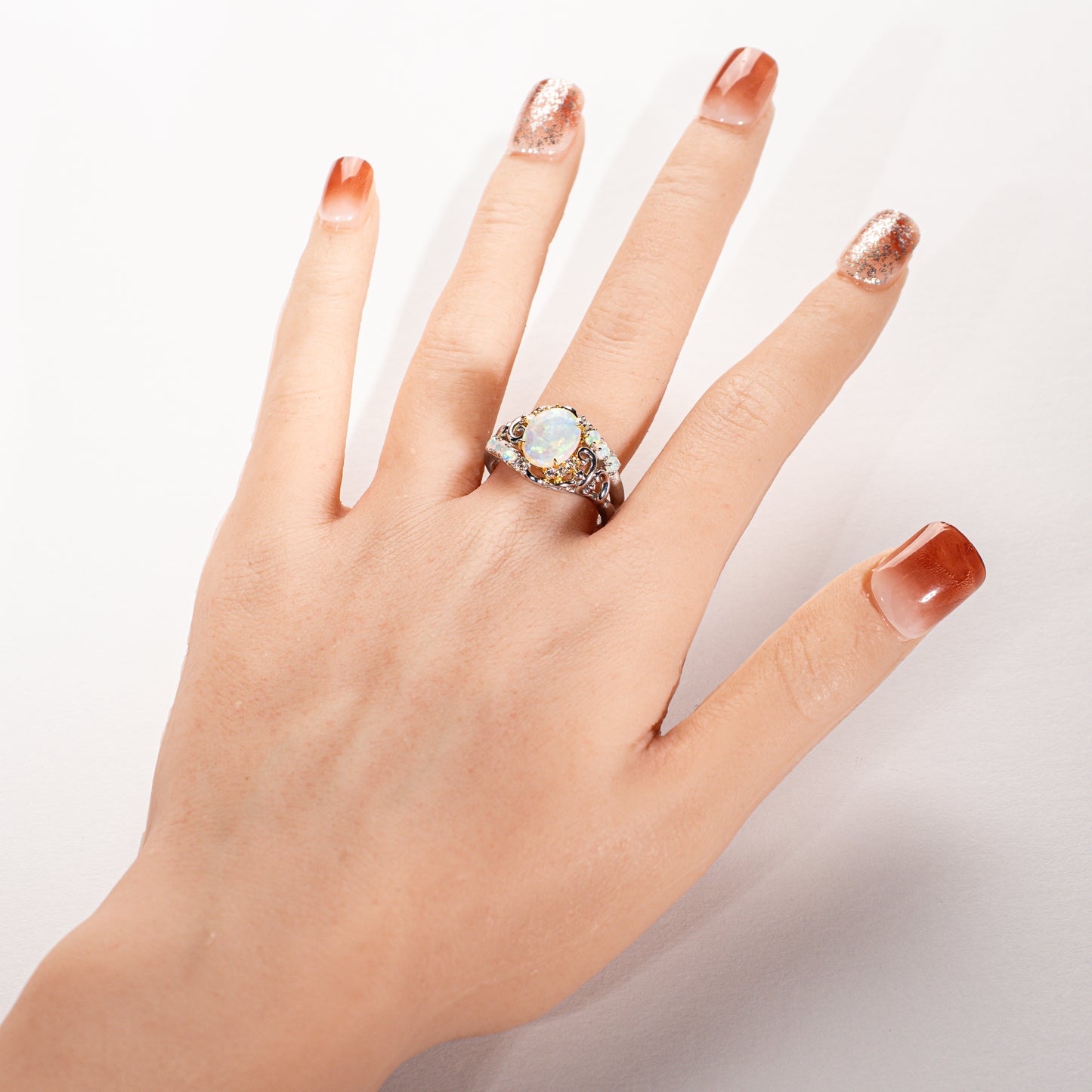 POLA エチオピアオパール1.40ct ダイヤモンド0.22ct Pt900/K18 ボタニカルリング