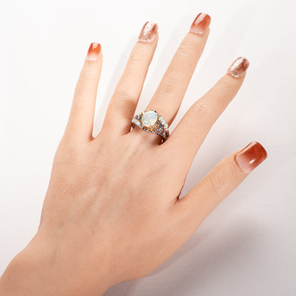 POLA エチオピアオパール1.40ct ダイヤモンド0.22ct Pt900/K18 ボタニカルリング
